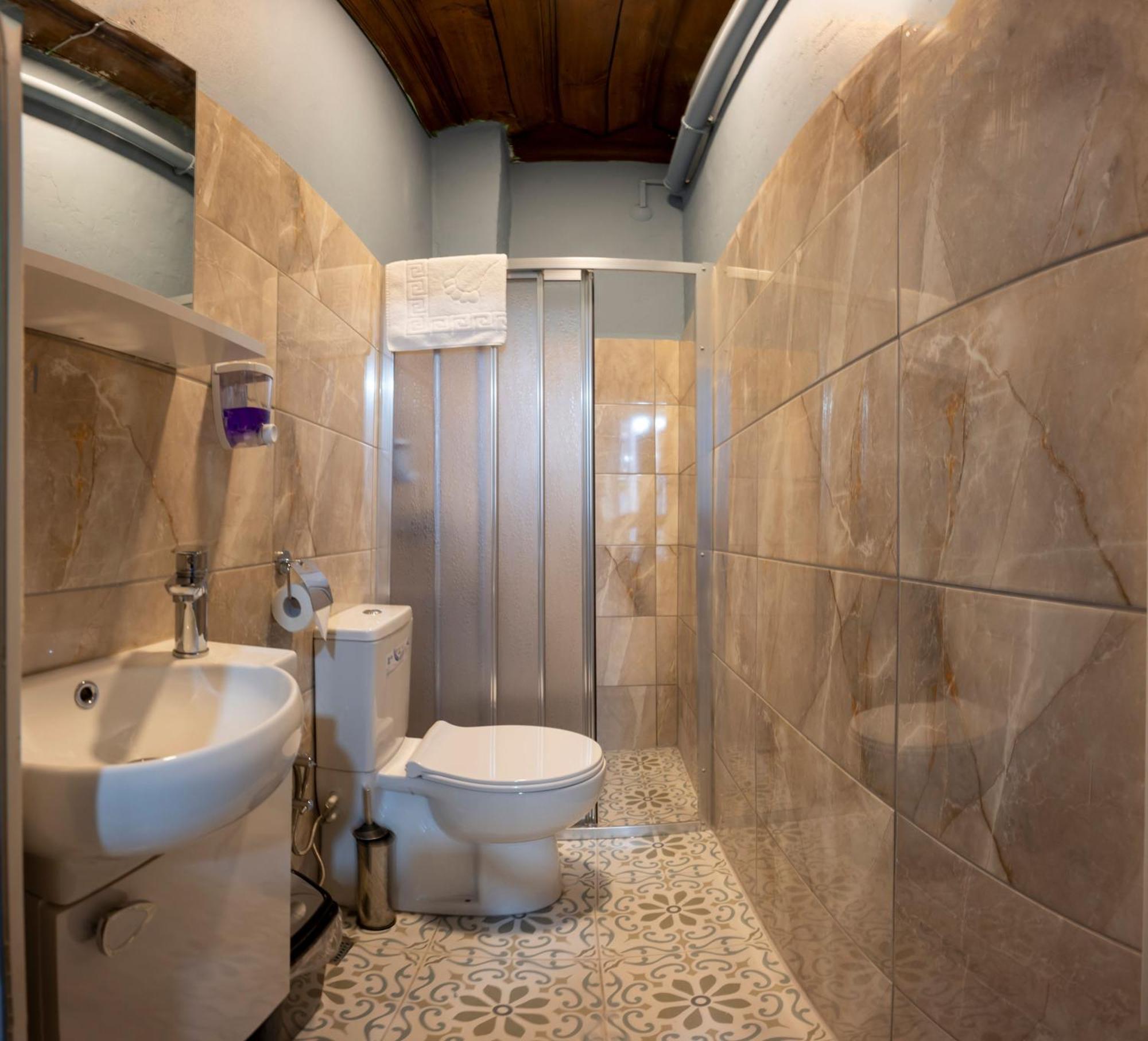 Taksimantiqueotel Otel